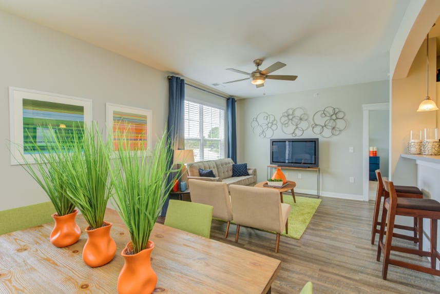 [[Sitting room in Noblesville apartments.